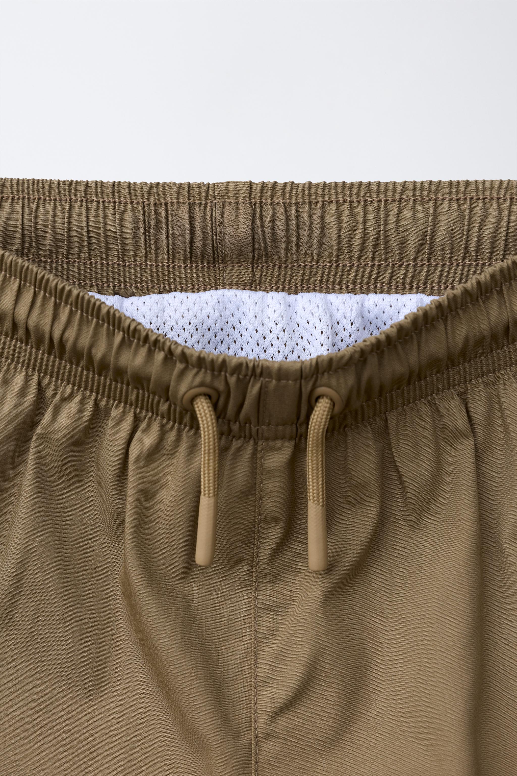4-10 ANS/ SHORT DE BAIN BRODÉ